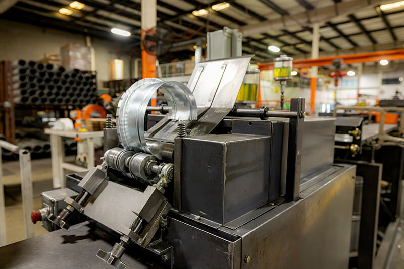 HVAC sheet metal fabrication process at MMF Inc including cutting and forming operations
